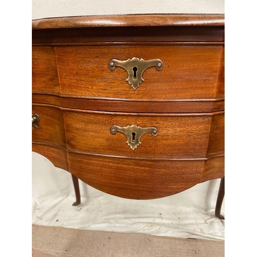 10 - A QUEEN ANNE STYLE WALNUT DESK, serpentine front with two drawers having brass handles, supported by... 