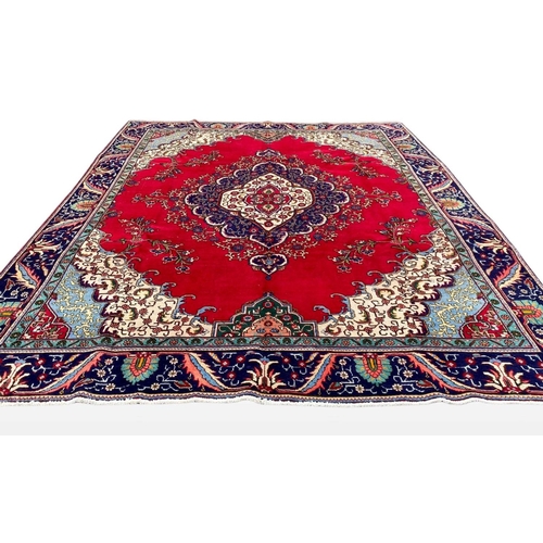 11 - A PERSIAN TABRIZ RUG, material: hand spun wool with natural organic dyes; design: this rug features ... 