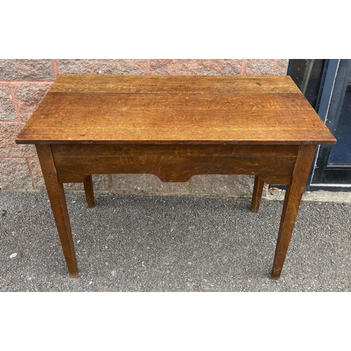 117 - AN ANTIQUE MAHOGANY SIDE TABLE, drawers to either side with ornate brass handles, standing on tapere... 