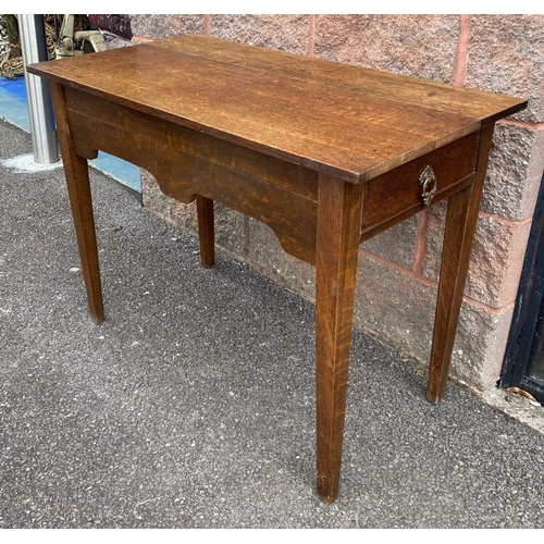 117 - AN ANTIQUE MAHOGANY SIDE TABLE, drawers to either side with ornate brass handles, standing on tapere... 