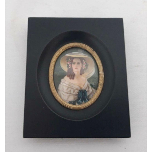 119 - AN OVAL MINIATURE PAINTING IN SQUARE FRAME, depicting seated female portrait. Dimensions: 10cm x 8cm... 