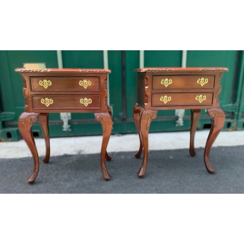 122 - A PAIR OF TWO DRAWER MAHOGANY BEDSIDE LOCKERS, drawers with brass handles, standing on carved cabrio... 