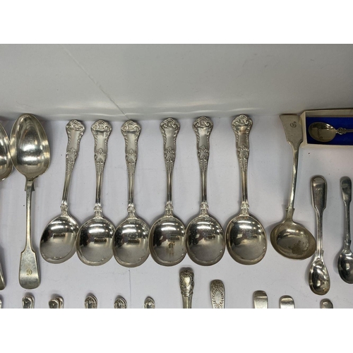 124 - A SILVER/ SILVER PLATED SPOON AND LADLE LOT TO INCLUDE (i) a decorative silver teaspoon, Maker Walte... 