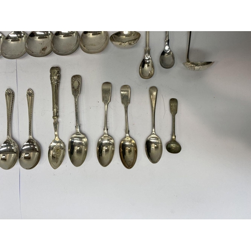 124 - A SILVER/ SILVER PLATED SPOON AND LADLE LOT TO INCLUDE (i) a decorative silver teaspoon, Maker Walte... 