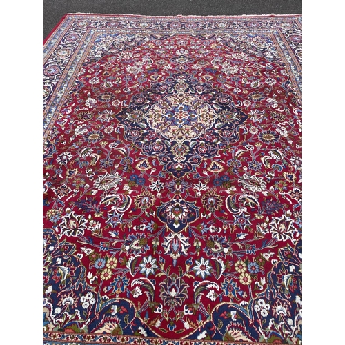 13 - A PERSIAN KASHAN RUG, material: hand spun wool with natural organic dyes; design: this rug features ... 