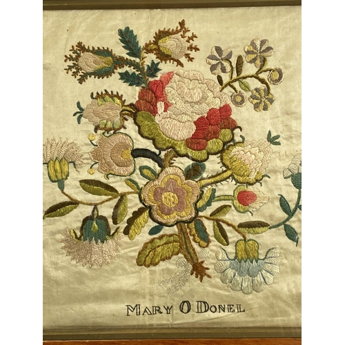 145 - A 19TH CENTURY FRAMED FLORAL EMBRIODERY ON SILK, in original frame, along with a hardwood framed pri... 