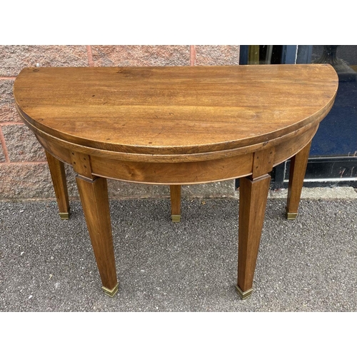 148 - A FRENCH CIRCULAR ART DECO STYLE MAHOGANY DINING TABLE, fold-over, standing on tapered leg. Dimensio... 