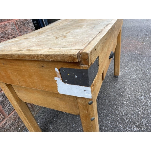 151 - AN ANTIQUE FRENCH STYLE BUTCHERS BLOCK, with one drawer to front, steel strap binding to corners, di... 