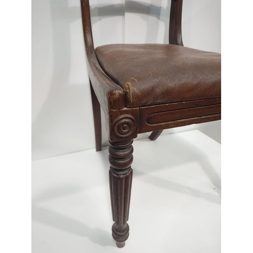 156 - AN EDWARDIAN MAHOGANY DINING CHAIR with rosewood veneer on top-rail, with each shoulder terminating ... 