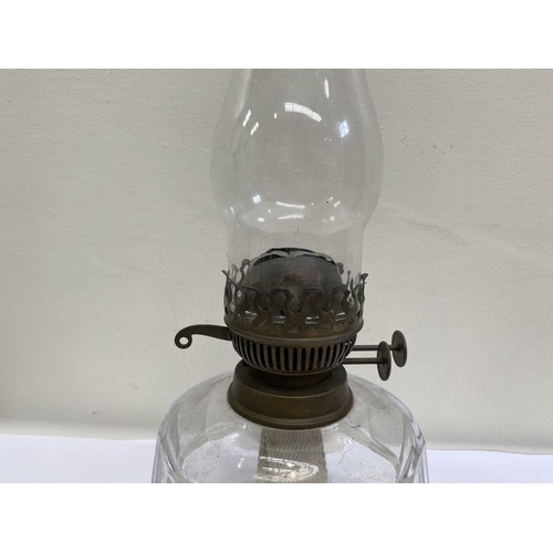 161 - A VINTAGE ENGLISH GLASS OIL LAMP, pressed and moulded glass with brass fittings. Thumb wheels marked... 