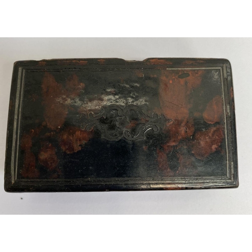 189 - A COLLECTION OF THREE 19TH CENTURY SNUFF BOXES, (i) a bog oak carved snuff box, of oval form, (ii) a... 