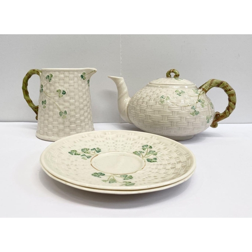 190 - A CLASSIC BELLEEK SHAMROCK JUG, TEAPOT AND TWO PLATES, Parian china in classic basket weave pattern ... 