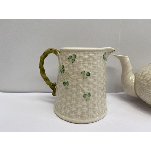 190 - A CLASSIC BELLEEK SHAMROCK JUG, TEAPOT AND TWO PLATES, Parian china in classic basket weave pattern ... 