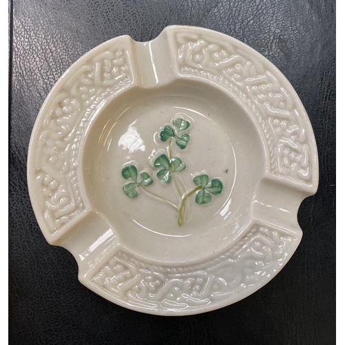 191 - A VINTAGE BELLEEK SUGAR BOWL AND CREAMER SET, this set is based on the shape of an antique Irish coo... 