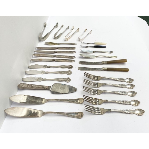 200 - A MIXED SILVER PLATED LOT TO INCLUDE (i) four sugar tongs, Makers Dixon, E & Co., one finely engrave... 