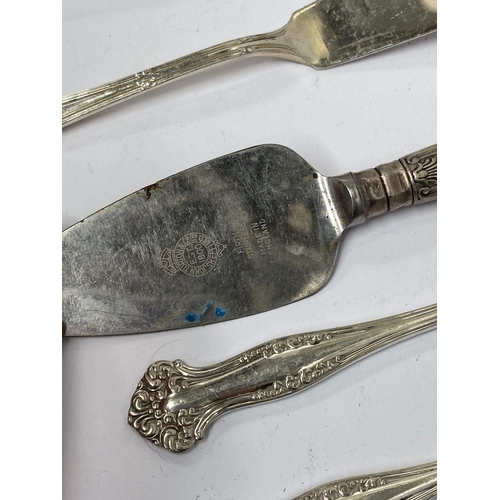 200 - A MIXED SILVER PLATED LOT TO INCLUDE (i) four sugar tongs, Makers Dixon, E & Co., one finely engrave... 