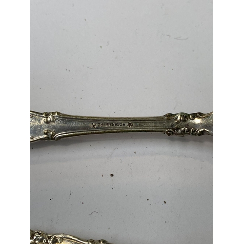 200 - A MIXED SILVER PLATED LOT TO INCLUDE (i) four sugar tongs, Makers Dixon, E & Co., one finely engrave... 