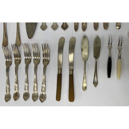 200 - A MIXED SILVER PLATED LOT TO INCLUDE (i) four sugar tongs, Makers Dixon, E & Co., one finely engrave... 