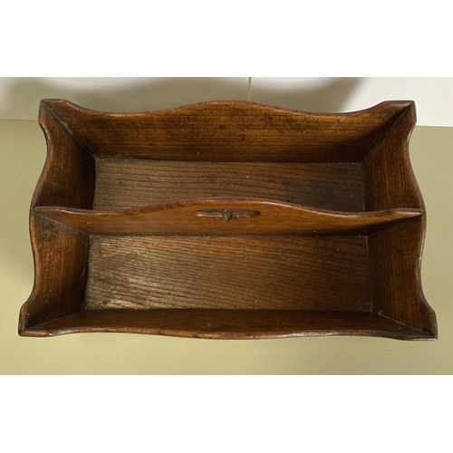 217 - AN ANTIQUE MAHOGANY CUTLERY TRAY, with cut out handles, two compartments. Dimensions: 24cm deep x 38... 