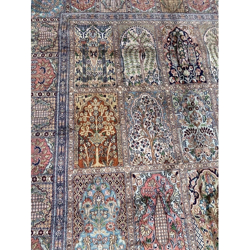 24 - A KASHIM SILK RUG, material: hand spun silk with natural organic dyes; design: this rug features a t... 