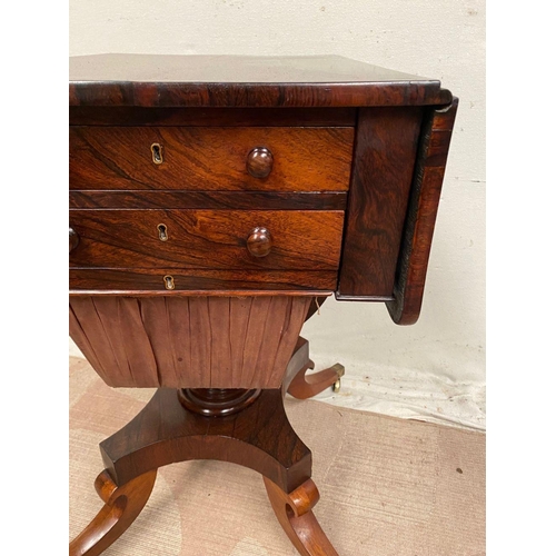 25 - A RECENCY ROSEWOOD DROP LEAF LAMP TABLE, on quatrefoil base on castors, dimensions: 42cm x 53cm x 69... 