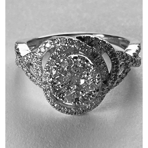 30 - AN EXQUISITE 18CT WHITE GOLD DIAMOND SWIRL RING, with cross over diamond shoulders, diamond weight: ... 