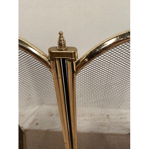 34 - A BRASS FOUR SCREEN FIRE GUARD, four arched screens, dimensions: 70cm long x 64cm high approx.