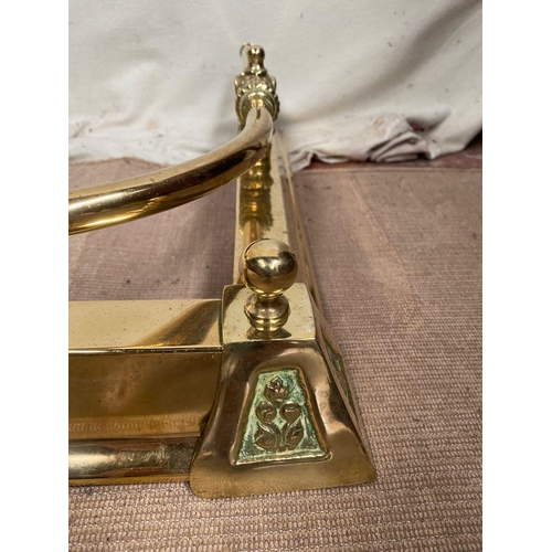 37 - A BRASS ADJUSTABLE FIRE FENDER, with decorative engraved finials, dimensions: 164cm opened; 153cm to... 