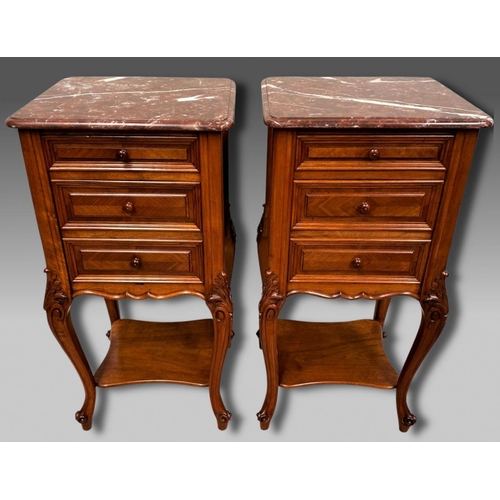 43 - A GREAT PAIR OF MARBLE TOPPED WALNUT THREE DRAWER CABINETS, the graduated three drawer cabinet raise... 