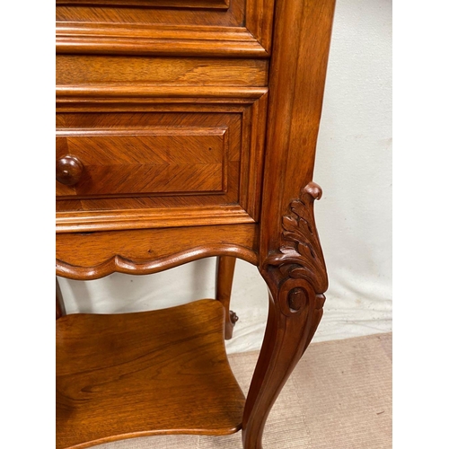 43 - A GREAT PAIR OF MARBLE TOPPED WALNUT THREE DRAWER CABINETS, the graduated three drawer cabinet raise... 