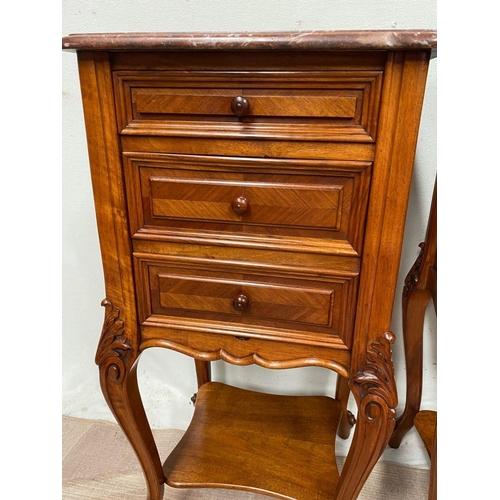 43 - A GREAT PAIR OF MARBLE TOPPED WALNUT THREE DRAWER CABINETS, the graduated three drawer cabinet raise... 