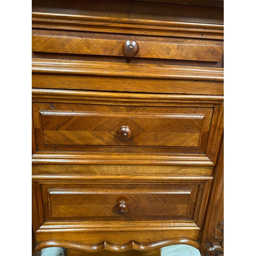 43 - A GREAT PAIR OF MARBLE TOPPED WALNUT THREE DRAWER CABINETS, the graduated three drawer cabinet raise... 