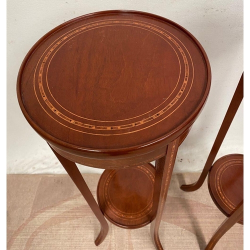 44 - A PAIR OF MAHOGANY INLAID POT STANDS, with circular tops having a low raised lip to the edge and inl... 