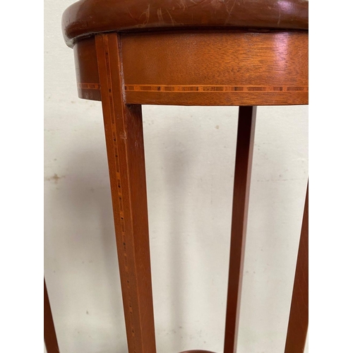 44 - A PAIR OF MAHOGANY INLAID POT STANDS, with circular tops having a low raised lip to the edge and inl... 