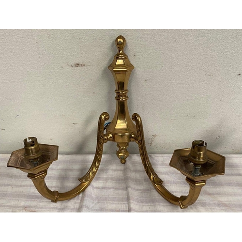 45 - A SET OF FOUR TWO ARM BRASS WALL SCONCE LIGHTS, good heavy brass set. 40cm wide x 33cm tall.