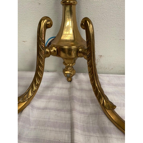 45 - A SET OF FOUR TWO ARM BRASS WALL SCONCE LIGHTS, good heavy brass set. 40cm wide x 33cm tall.