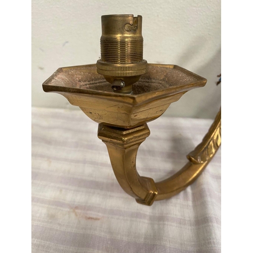 45 - A SET OF FOUR TWO ARM BRASS WALL SCONCE LIGHTS, good heavy brass set. 40cm wide x 33cm tall.