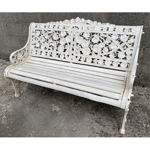 5 - A WHITE CAST IRON COALBROOKDALE STYLE GARDEN SEAT, ‘Nasturtium’ pattern to back, naturalistic scroll... 