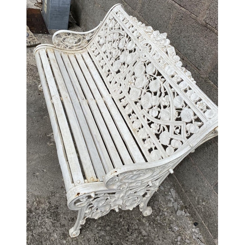 5 - A WHITE CAST IRON COALBROOKDALE STYLE GARDEN SEAT, ‘Nasturtium’ pattern to back, naturalistic scroll... 