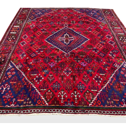 6 - A PERSIAN JOSHAGAN RUG, material: hand spun wool with natural organic dyes; design: this rug feature... 