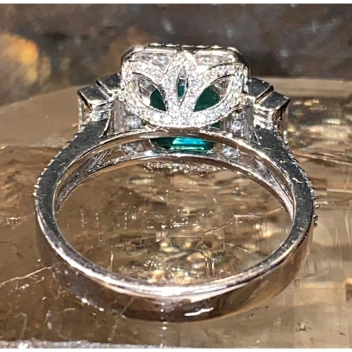 67 - AN EXCEPTIONAL 18CT WHITE GOLD NATURAL COLUMBIAN EMERALD AND DIAMOND CLUSTER RING, natural Colombian... 