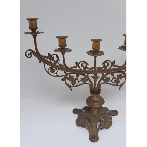 78 - AN ANTIQUE DECORATIVE FIVE BRANCH CANDLEABRA, with decorative floral openwork to stem and shaped bas... 