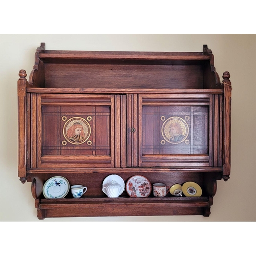 90 - A LATE 19TH / EARLY 20TH CENTURY CARVED & PAINTED OAK HANGING WALL CABINET, in the style of Bruce Ta... 