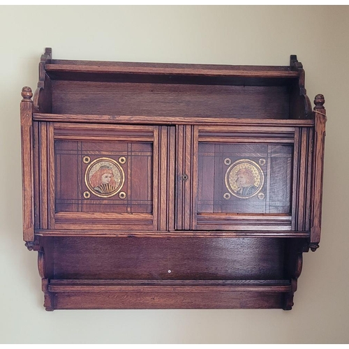 90 - A LATE 19TH / EARLY 20TH CENTURY CARVED & PAINTED OAK HANGING WALL CABINET, in the style of Bruce Ta... 