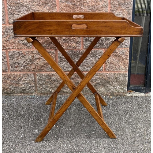 93 - A 19TH CENTURY MAHOGANY BUTLERS TRAY AND STAND, dovetailed mahogany tray with cut out handles, tray ... 