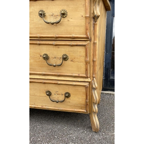 94 - A FRENCH OAK CHEST OF DRAWERS, three drawers with brass handles, with carved supports.