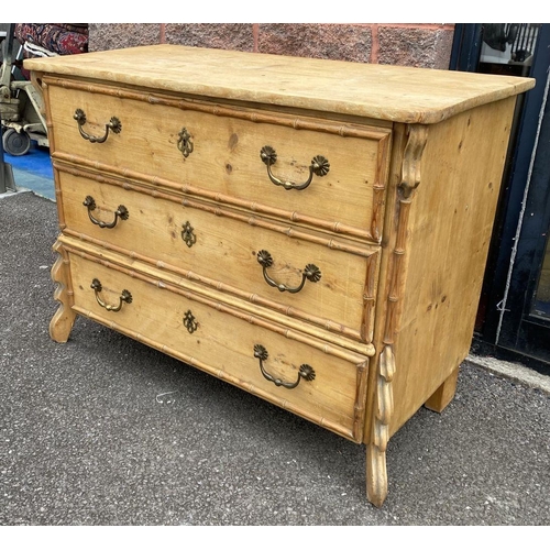 94 - A FRENCH OAK CHEST OF DRAWERS, three drawers with brass handles, with carved supports.