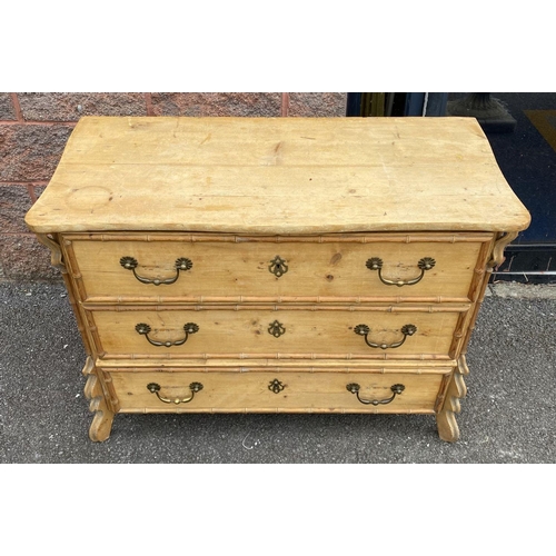 94 - A FRENCH OAK CHEST OF DRAWERS, three drawers with brass handles, with carved supports.