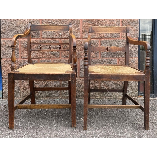 95 - TWO SOLID GEORGIAN ARMCHAIRS, both with cane seats, with carved back splats, turned armrests, suppor... 