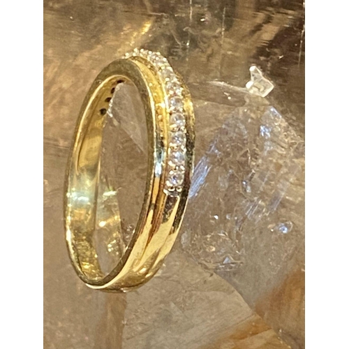 98 - AN ORNATE 18CT YELLOW GOLD DIAMOND CHANNEL SET RING, yellow gold diamond band claw channel set with ... 